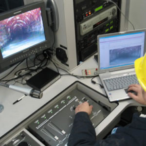 crew member analyzing data on site