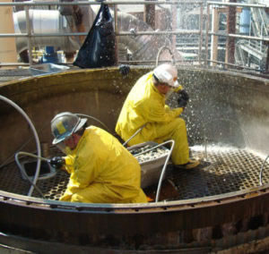 two Carylon crew members performing hydro blasting